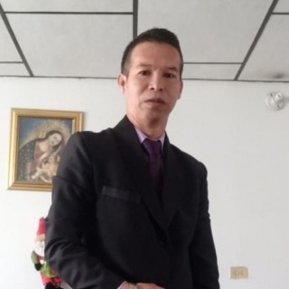 A person in a suit

AI-generated content may be incorrect.